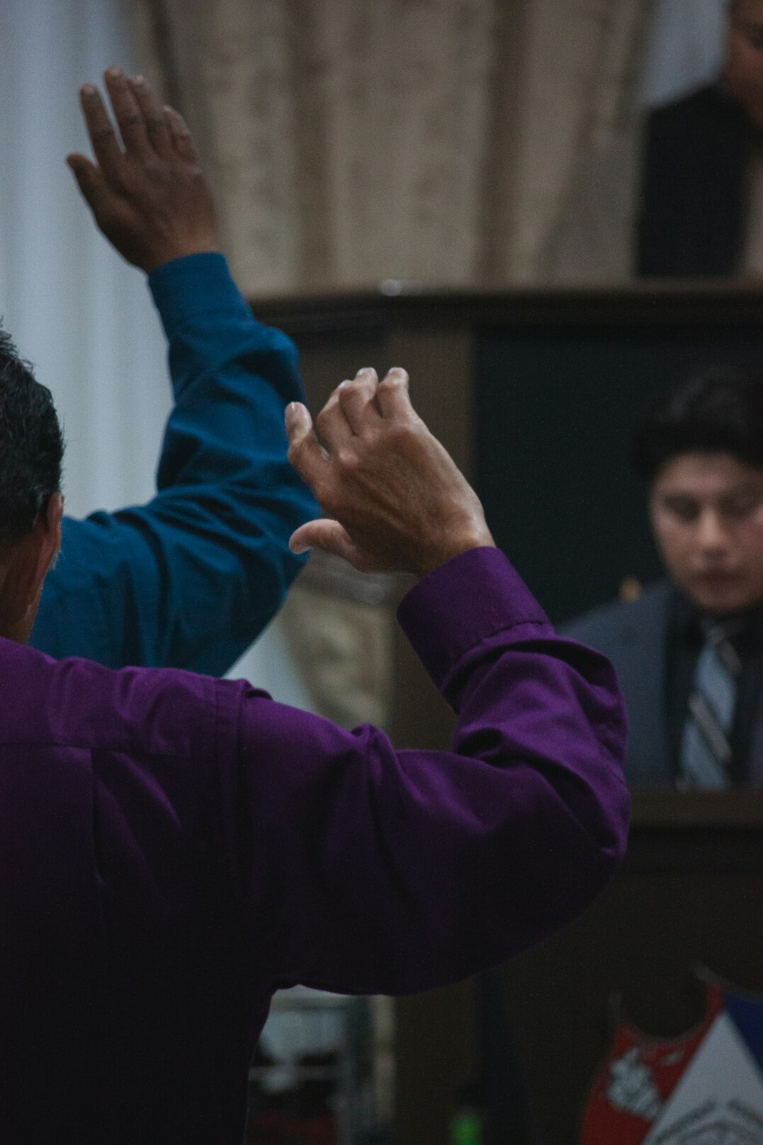 debate participants arguing