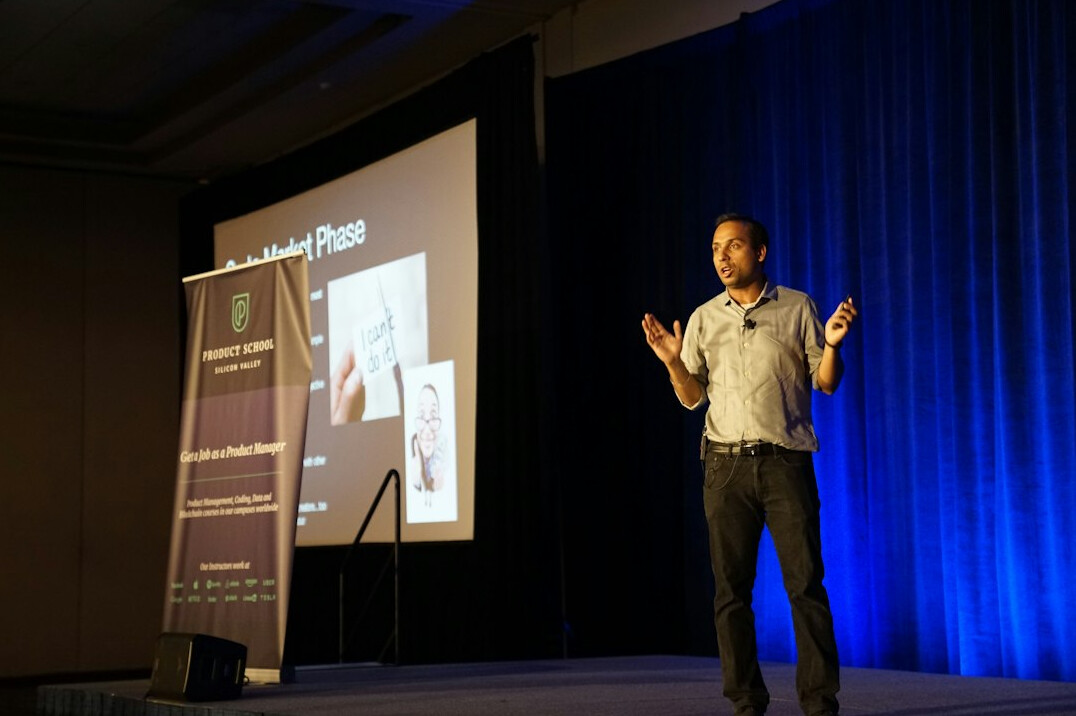 business leader speaking at conference